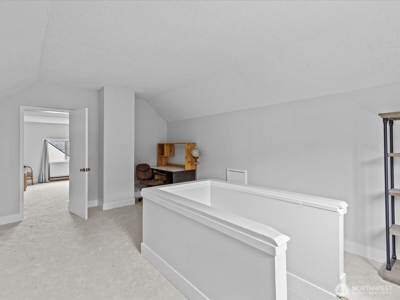 6507 Cady Road Everett, WA 98203 - Photo 25 of 29 a room with a bed and a tv