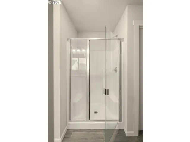 a view of a bathroom with a shower