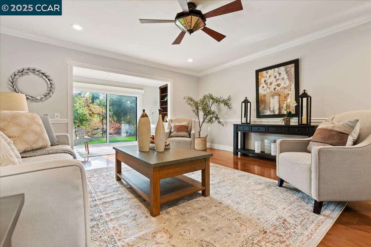 1857 Golden Rain Road, Unit 2 Walnut Creek, CA 94595 - Photo 11 of 39 a living room with furniture and a large window
