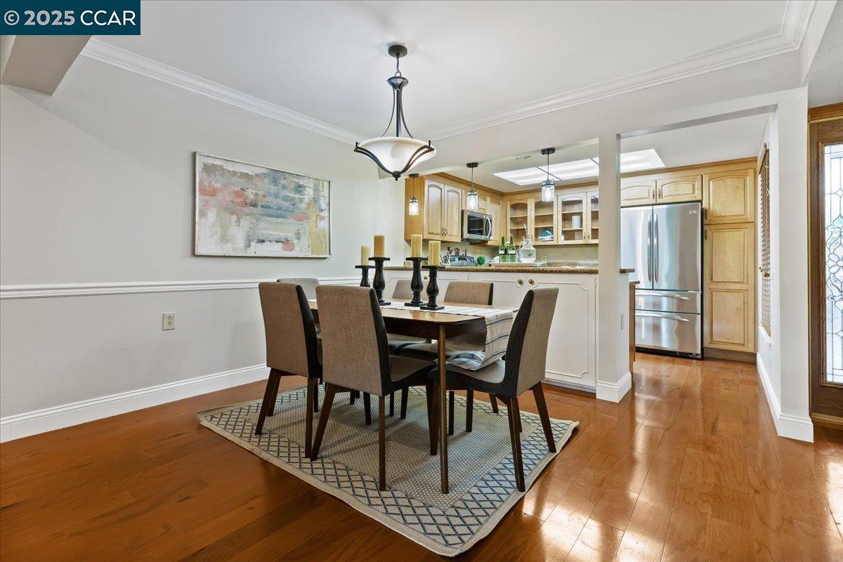 1857 Golden Rain Road, Unit 2 Walnut Creek, CA 94595 - Photo 18 of 39 a view of a dining room with furniture
