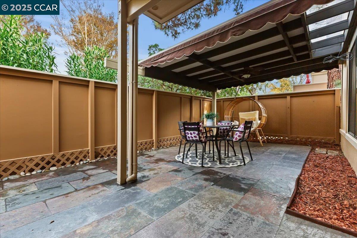 1857 Golden Rain Road, Unit 2 Walnut Creek, CA 94595 - Photo 5 of 39 a view of outdoor space with table and chairs