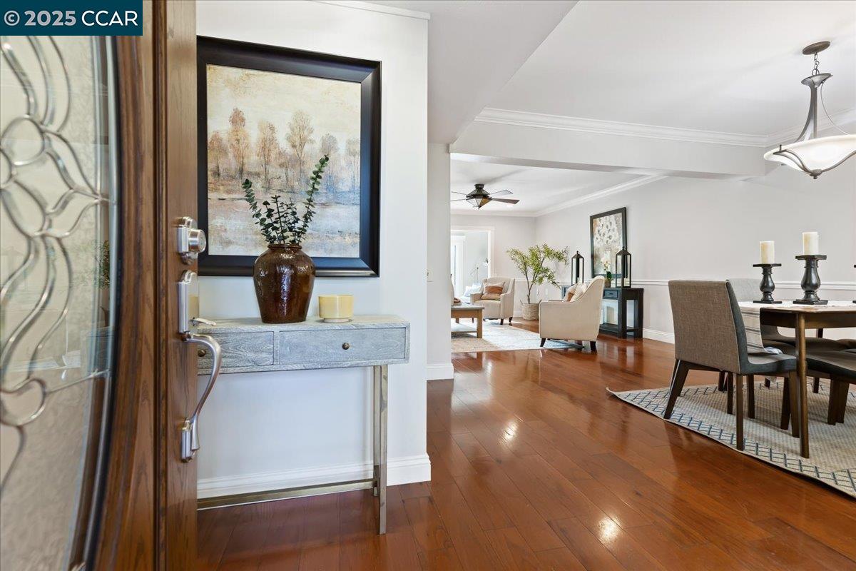 1857 Golden Rain Road, Unit 2 Walnut Creek, CA 94595 - Photo 7 of 39 a living room with furniture and a large window