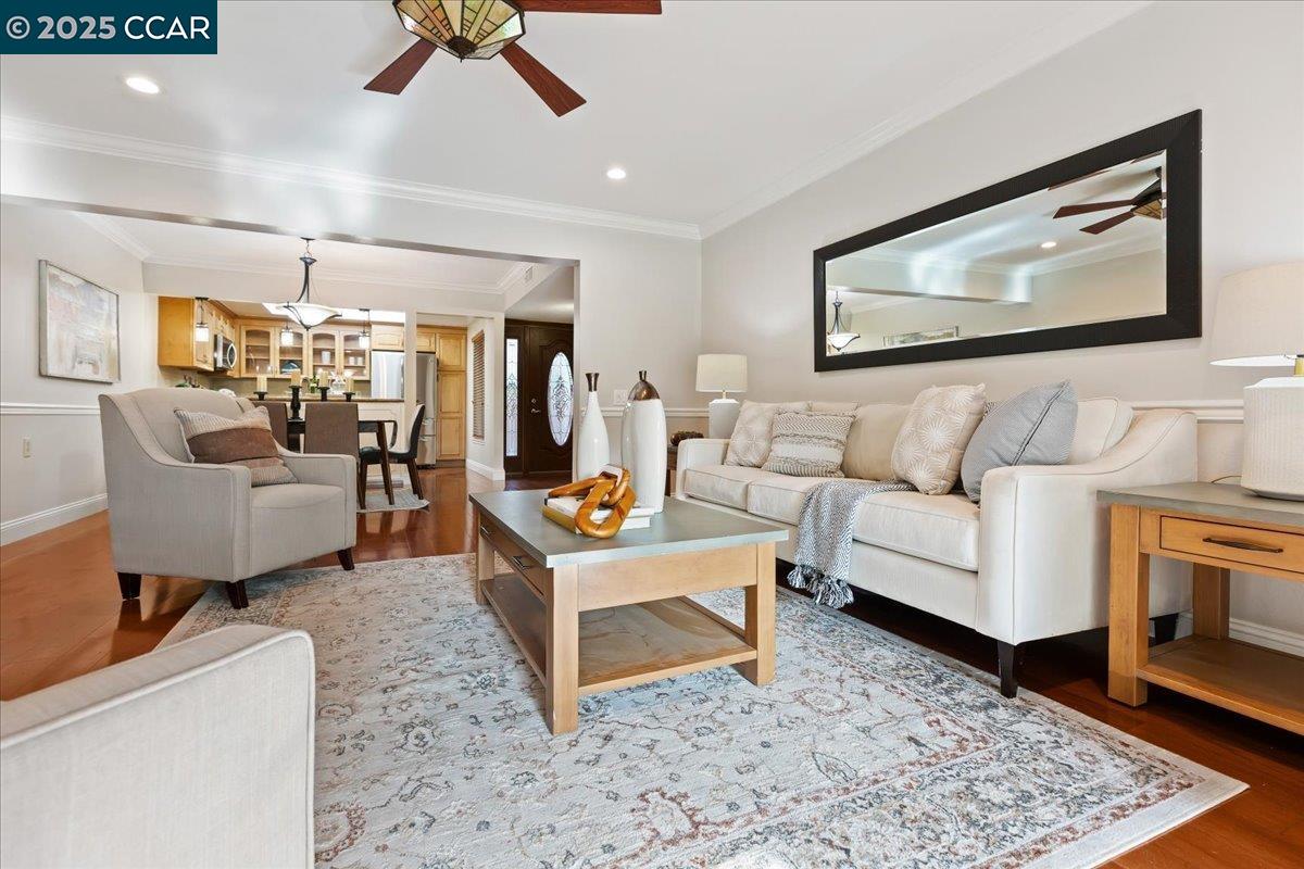 1857 Golden Rain Road, Unit 2 Walnut Creek, CA 94595 - Photo 9 of 39 a living room with furniture and a rug