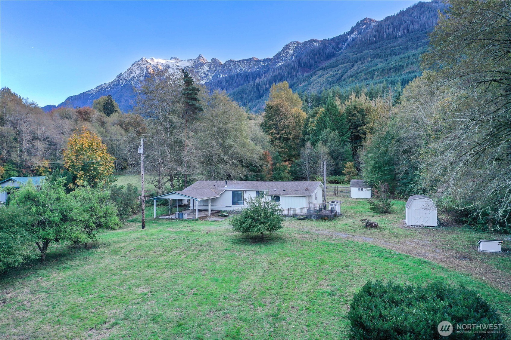 37402 State Rte 530 Northeast Arlington, WA 98223 - Photo 2 of 11 an aerial view of a house with mountain view