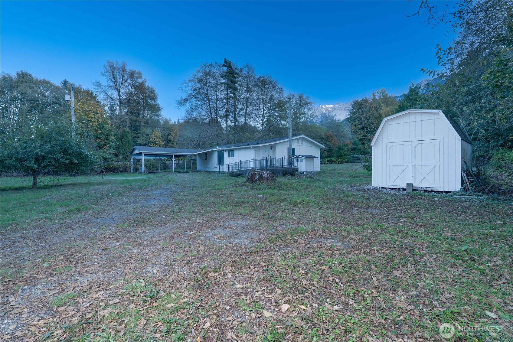 37402 State Rte 530 Northeast Arlington, WA 98223 - Photo 3 of 11 a view of an house with backyard space and garden