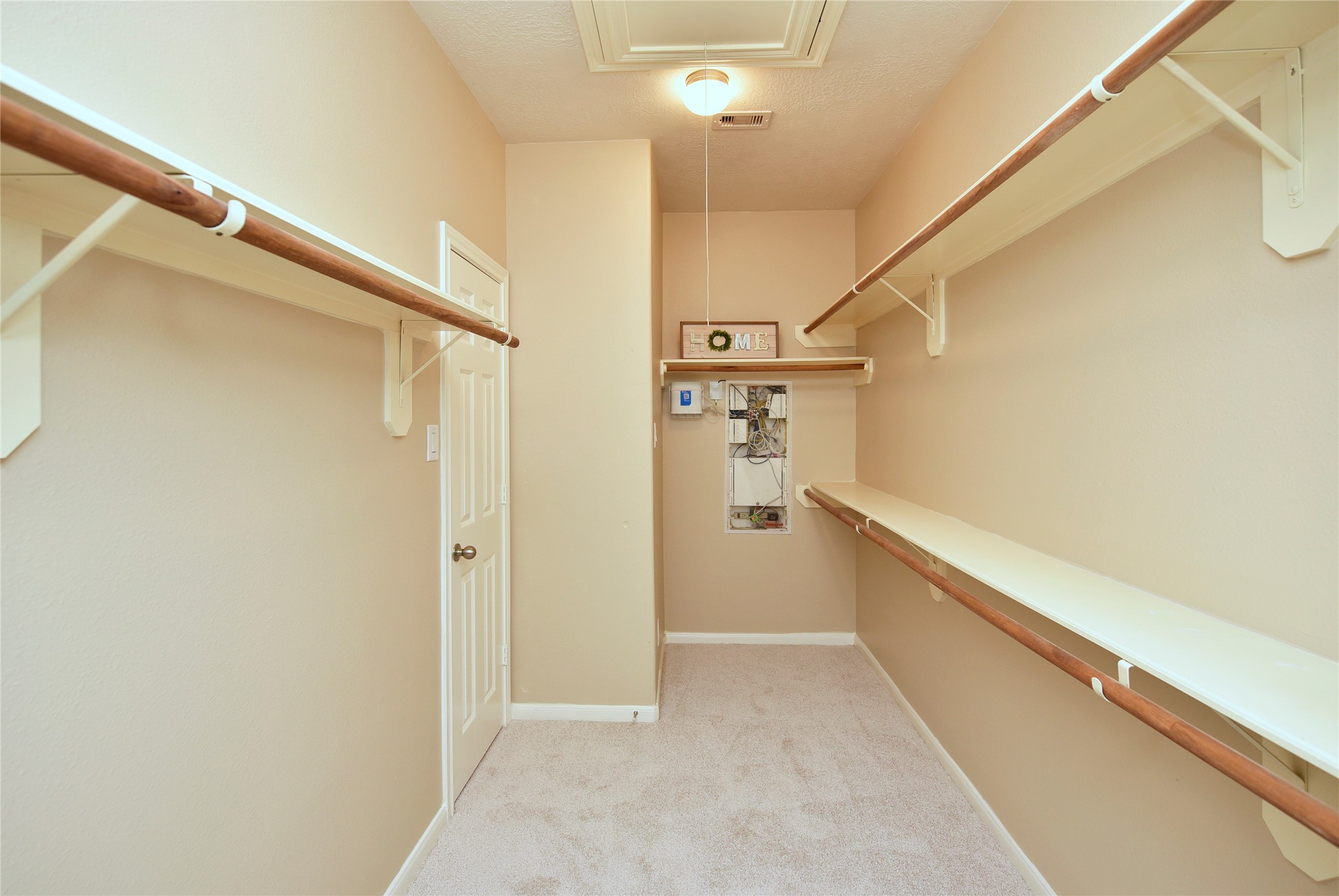 29703 Meridian Hill Drive Spring, TX 77386 - Photo 19 of 43 a view of hallway with stairs and a chandelier