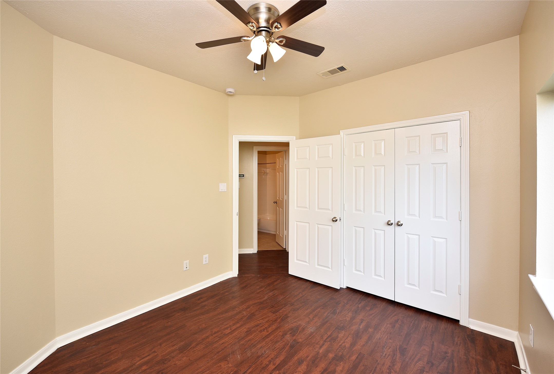 29703 Meridian Hill Drive Spring, TX 77386 - Photo 22 of 43 a view of an empty room with wooden floor