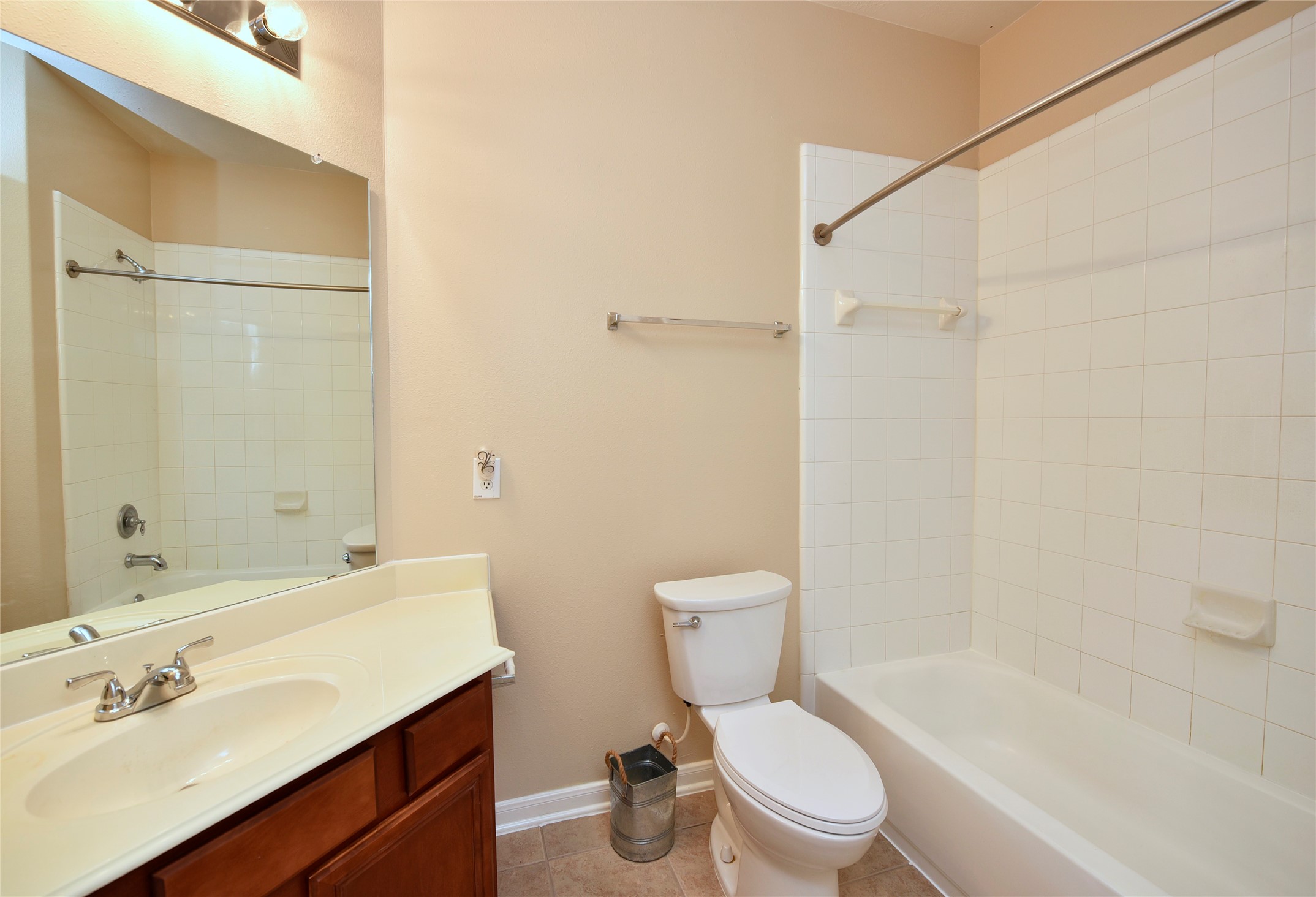 29703 Meridian Hill Drive Spring, TX 77386 - Photo 25 of 43 a white toilet sitting next to a bathroom sink