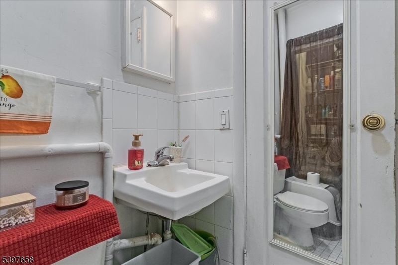 104 Ridgedale Avenue Cedar Knolls, NJ 07927 - Photo 16 of 47 a bathroom with a sink toilet and shower
