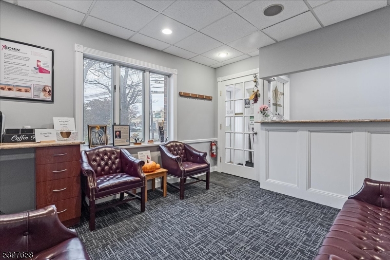 104 Ridgedale Avenue Cedar Knolls, NJ 07927 - Photo 18 of 47 a living room with furniture