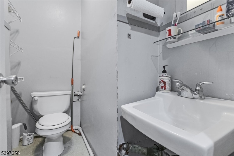 104 Ridgedale Avenue Cedar Knolls, NJ 07927 - Photo 27 of 47 a bathroom with a sink a toilet and shower