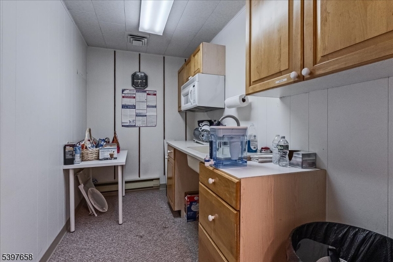 104 Ridgedale Avenue Cedar Knolls, NJ 07927 - Photo 35 of 47 a room with storage and utility