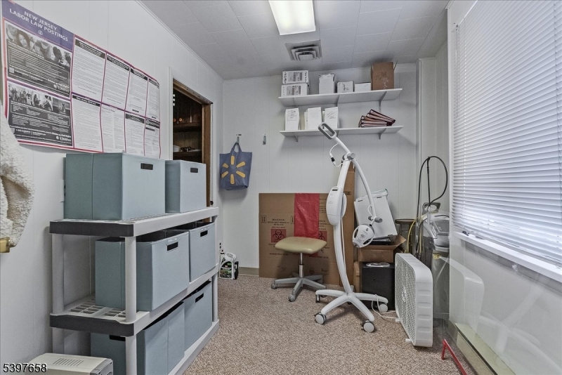 104 Ridgedale Avenue Cedar Knolls, NJ 07927 - Photo 36 of 47 a room with gym equipment and white walls