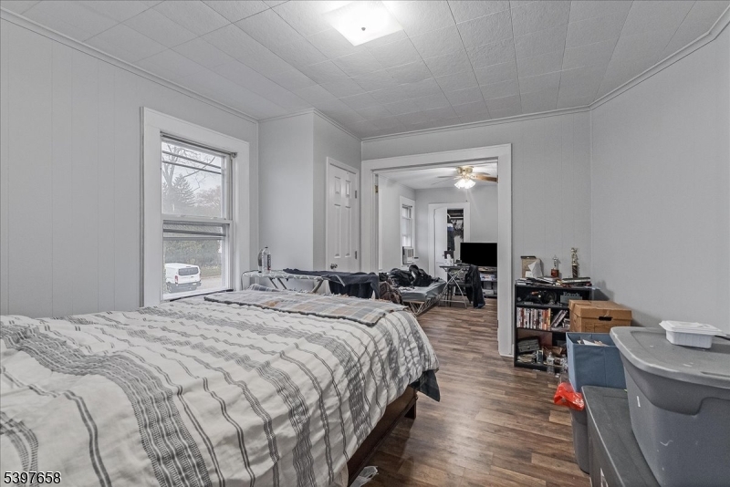 104 Ridgedale Avenue Cedar Knolls, NJ 07927 - Photo 39 of 47 a bed room with a bed and a table