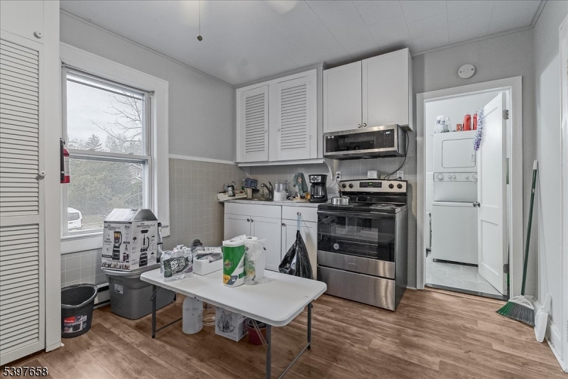 104 Ridgedale Avenue Cedar Knolls, NJ 07927 - Photo 41 of 47 a kitchen with a refrigerator and a stove top oven