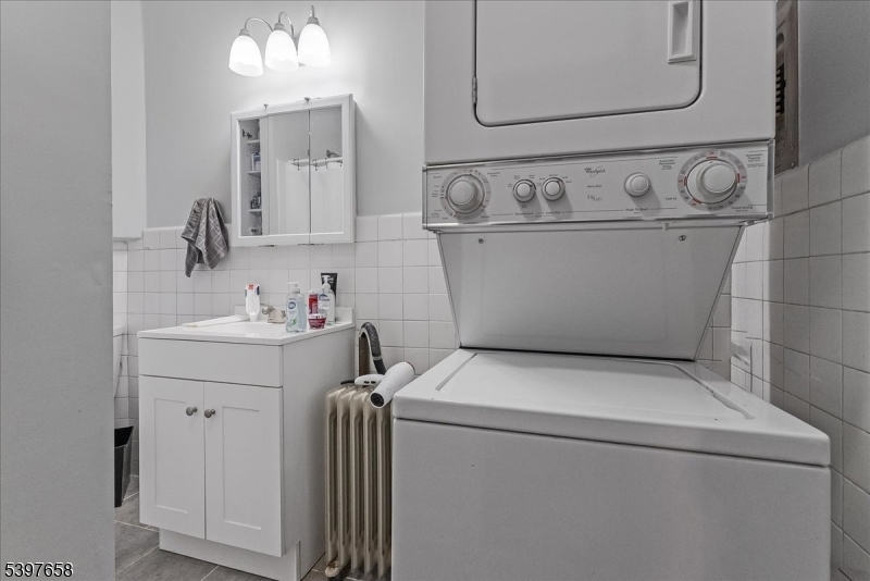 104 Ridgedale Avenue Cedar Knolls, NJ 07927 - Photo 43 of 47 a utility room with dryer and washer
