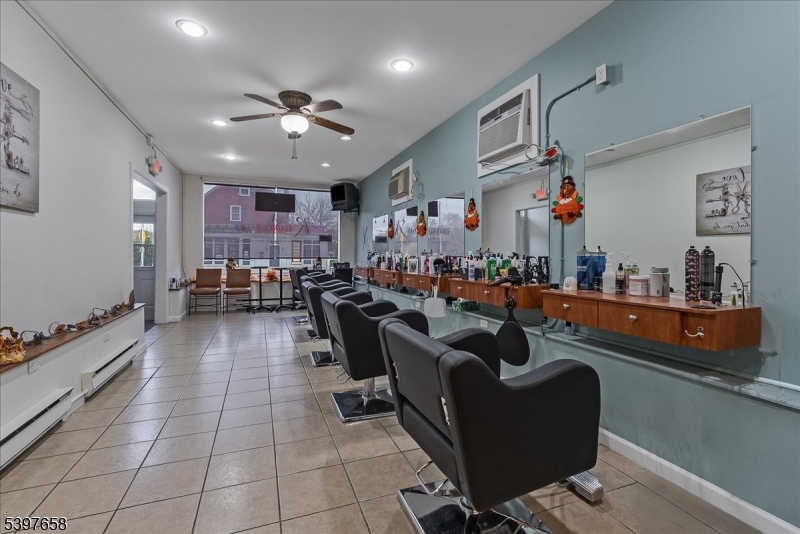 104 Ridgedale Avenue Cedar Knolls, NJ 07927 - Photo 5 of 47 a living room with furniture and a flat screen tv