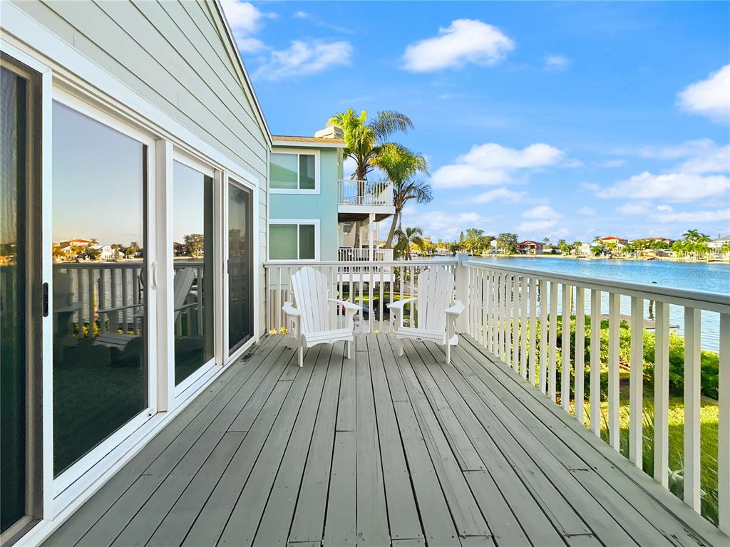 2505 Bay Boulevard, Unit 1 Indian Rocks Beach, FL 33785 - Photo 3 of 25 a view of a balcony with wooden floor