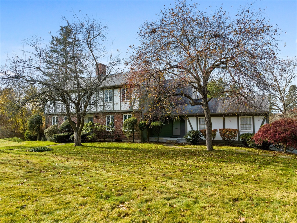 65 Temple Road Wellesley, MA 02482 - Photo 6 of 9 a view of a house with a yard