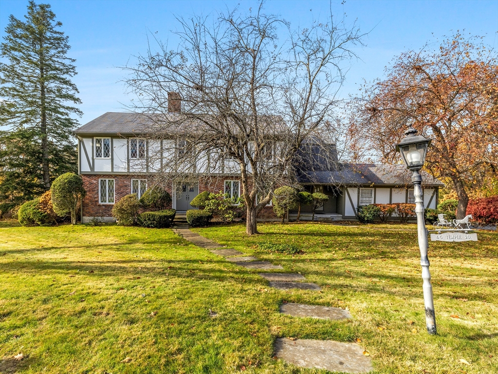 65 Temple Road Wellesley, MA 02482 - Photo 7 of 9 a view of a house with a yard