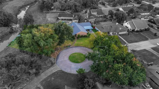 an aerial view of a house with garden