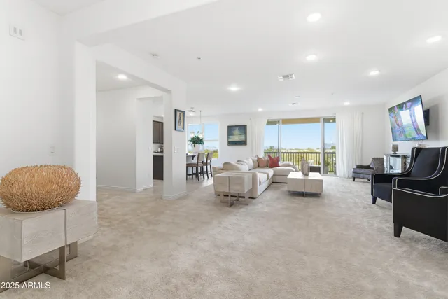 a living room with furniture and a couch