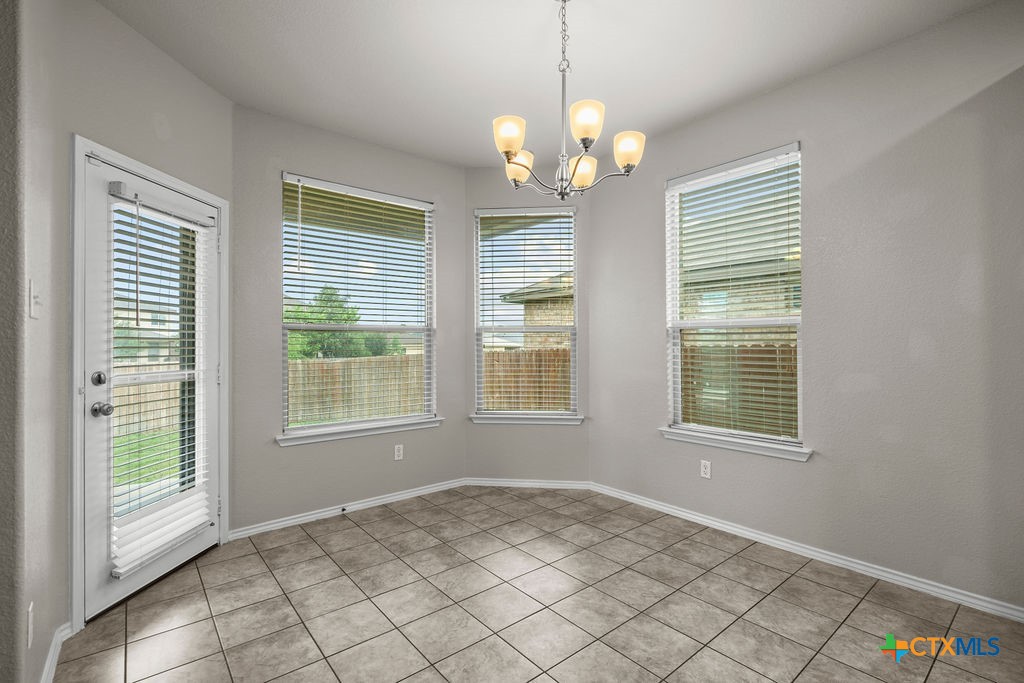 Undisclosed Address Temple, TX 76502 - Photo 12 of 36 a view of an empty room with windows
