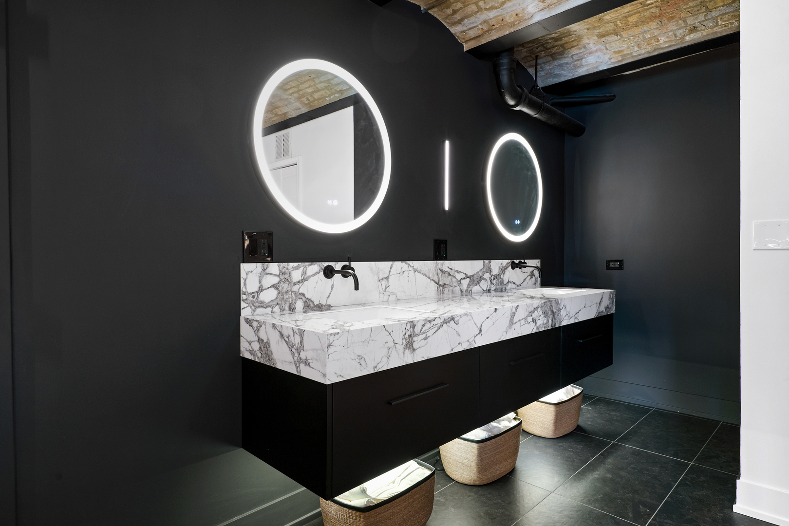 2101 West Rice Street, Unit 308 Chicago, IL 60622 - Photo 14 of 22 a bathroom with a sink and a mirror