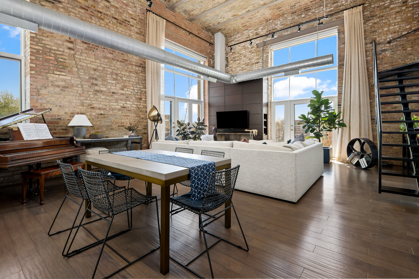 2101 West Rice Street, Unit 308 Chicago, IL 60622 - Photo 2 of 22 a view of a patio with table and chairs