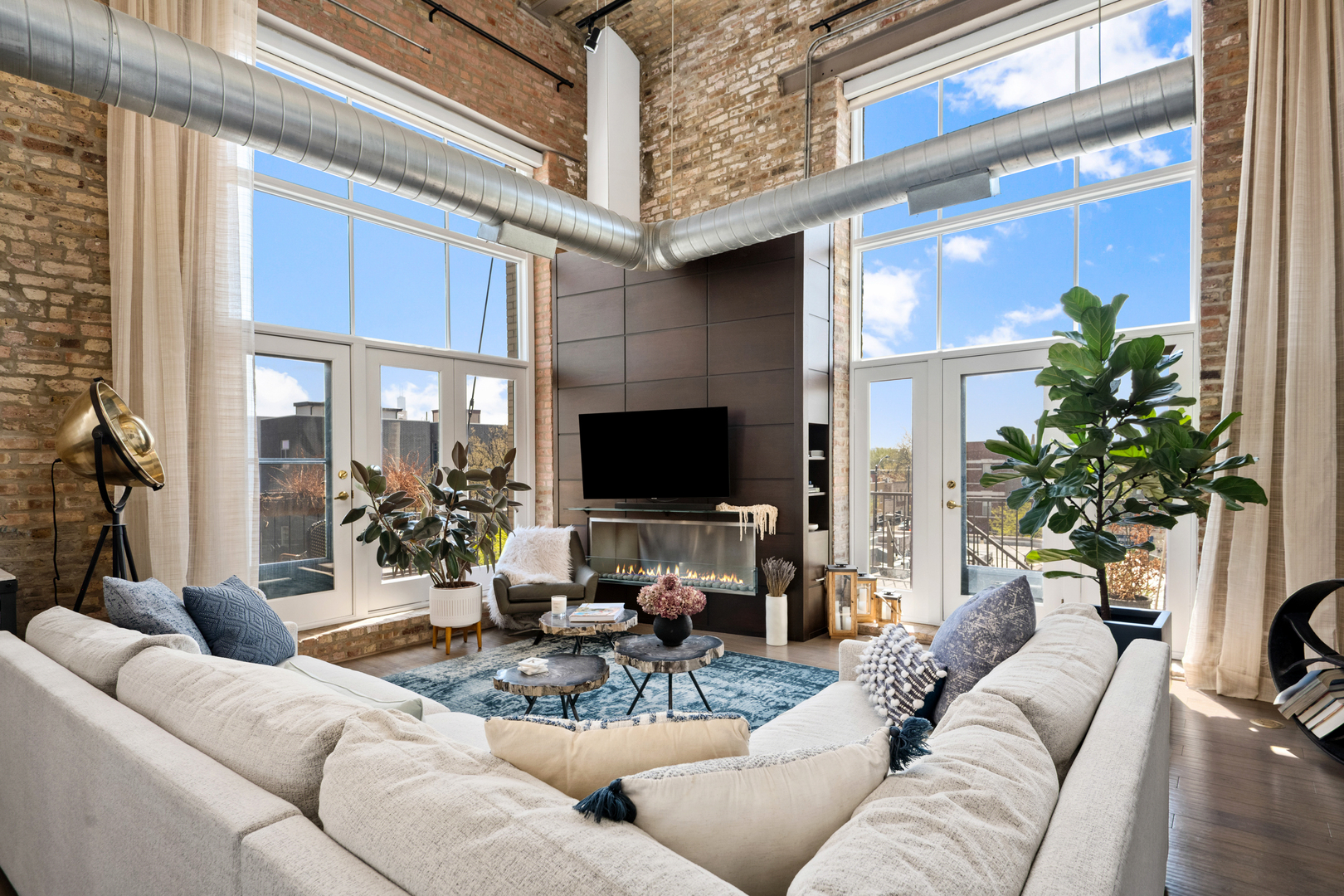 2101 West Rice Street, Unit 308 Chicago, IL 60622 - Photo 4 of 22 a living room with furniture and a flat screen tv