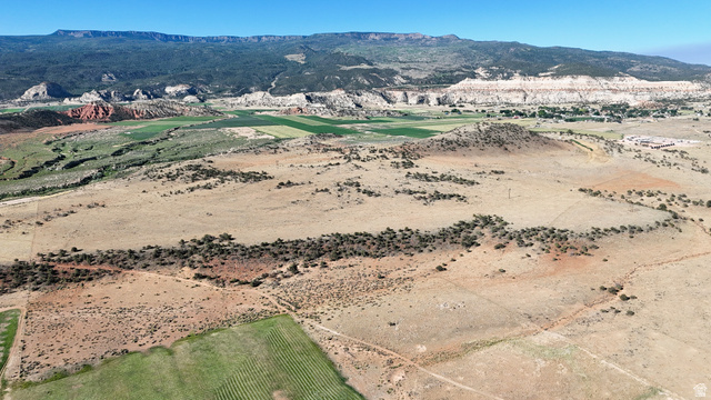 123 Teasdale Powerline Road Torrey, UT 84773 - Photo 44 of 62 Aerial view of a mountain backdrop