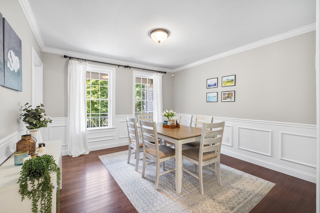 236 Pepperell Road Groton, MA 01450 - Photo 12 of 42 a view of a dining room with furniture and a potted plant
