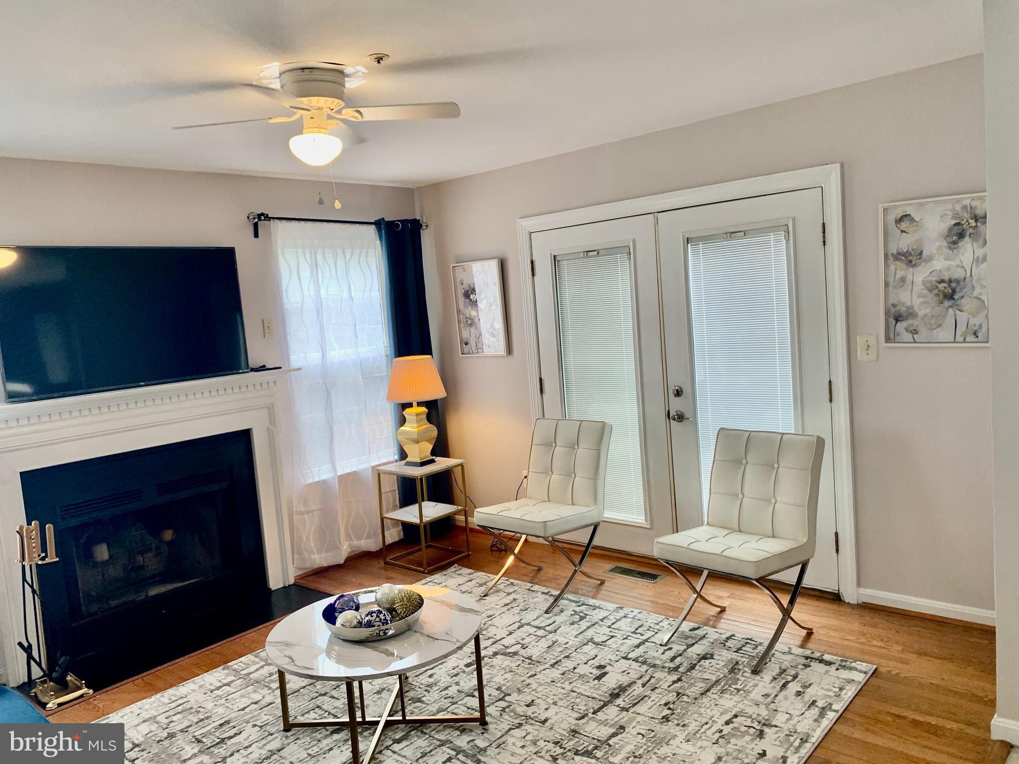 2104 Sayan Court Temple Hills, MD 20748 - Photo 12 of 28 a living room with furniture and a fireplace