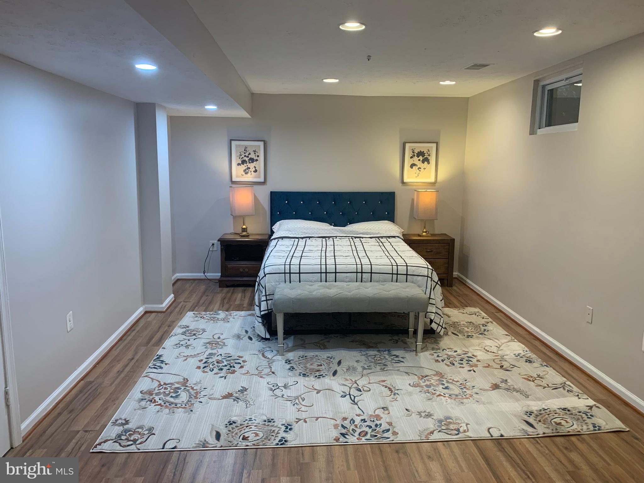 2104 Sayan Court Temple Hills, MD 20748 - Photo 23 of 28 a room with a bed and a window