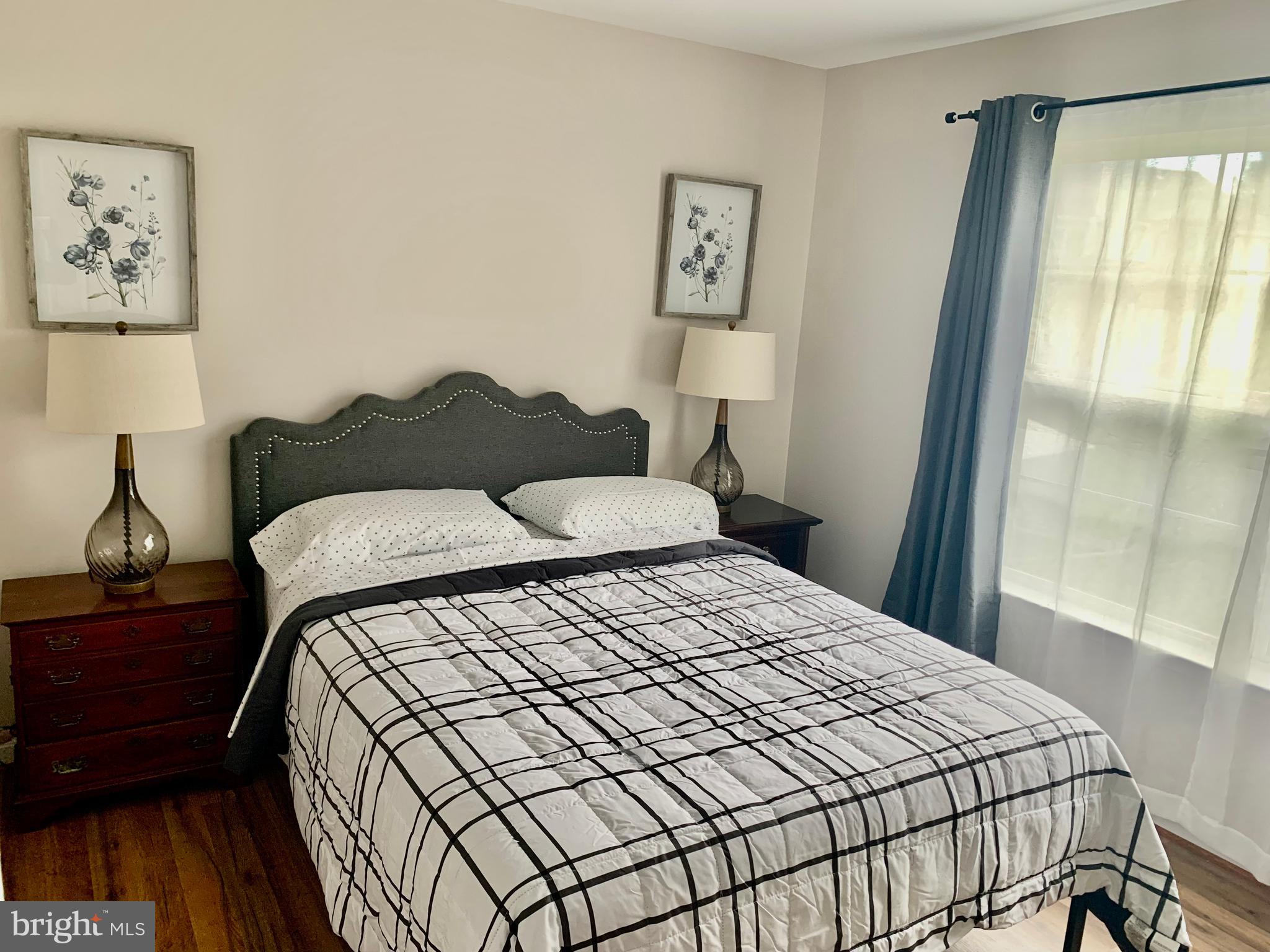 2104 Sayan Court Temple Hills, MD 20748 - Photo 6 of 28 a bedroom with a bed and a window