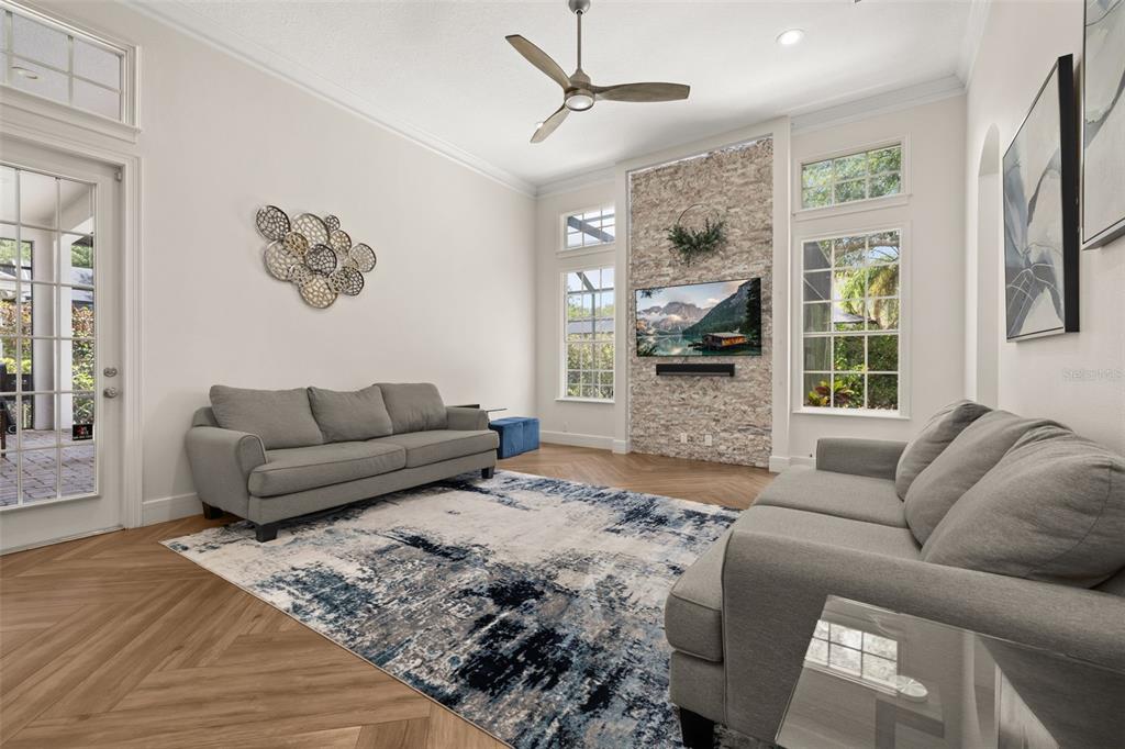 8351 Bowden Way Windermere, FL 34786 - Photo 18 of 71 a living room with furniture and a large window
