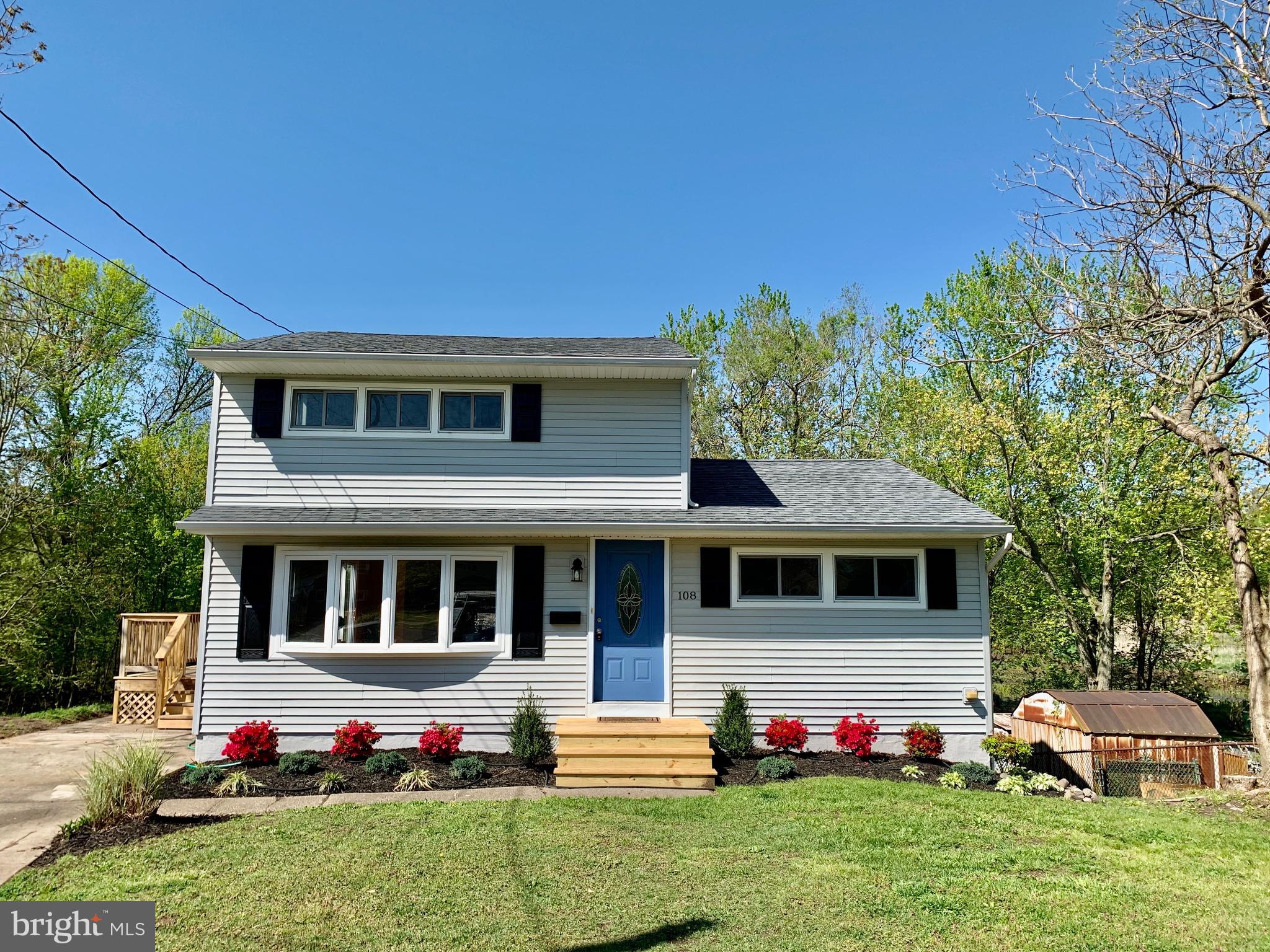 108 West Roland Avenue Maple Shade, NJ 08052 - Photo 1 of 23 a front view of a house with a yard