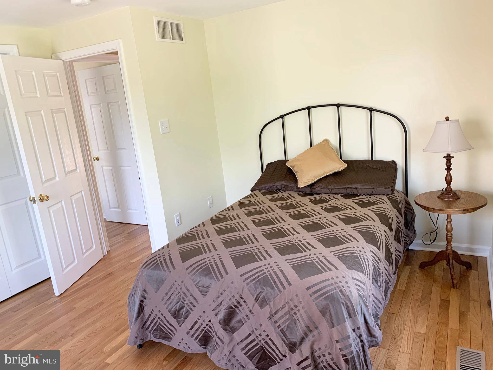 108 West Roland Avenue Maple Shade, NJ 08052 - Photo 14 of 23 a bedroom with a bed and a window
