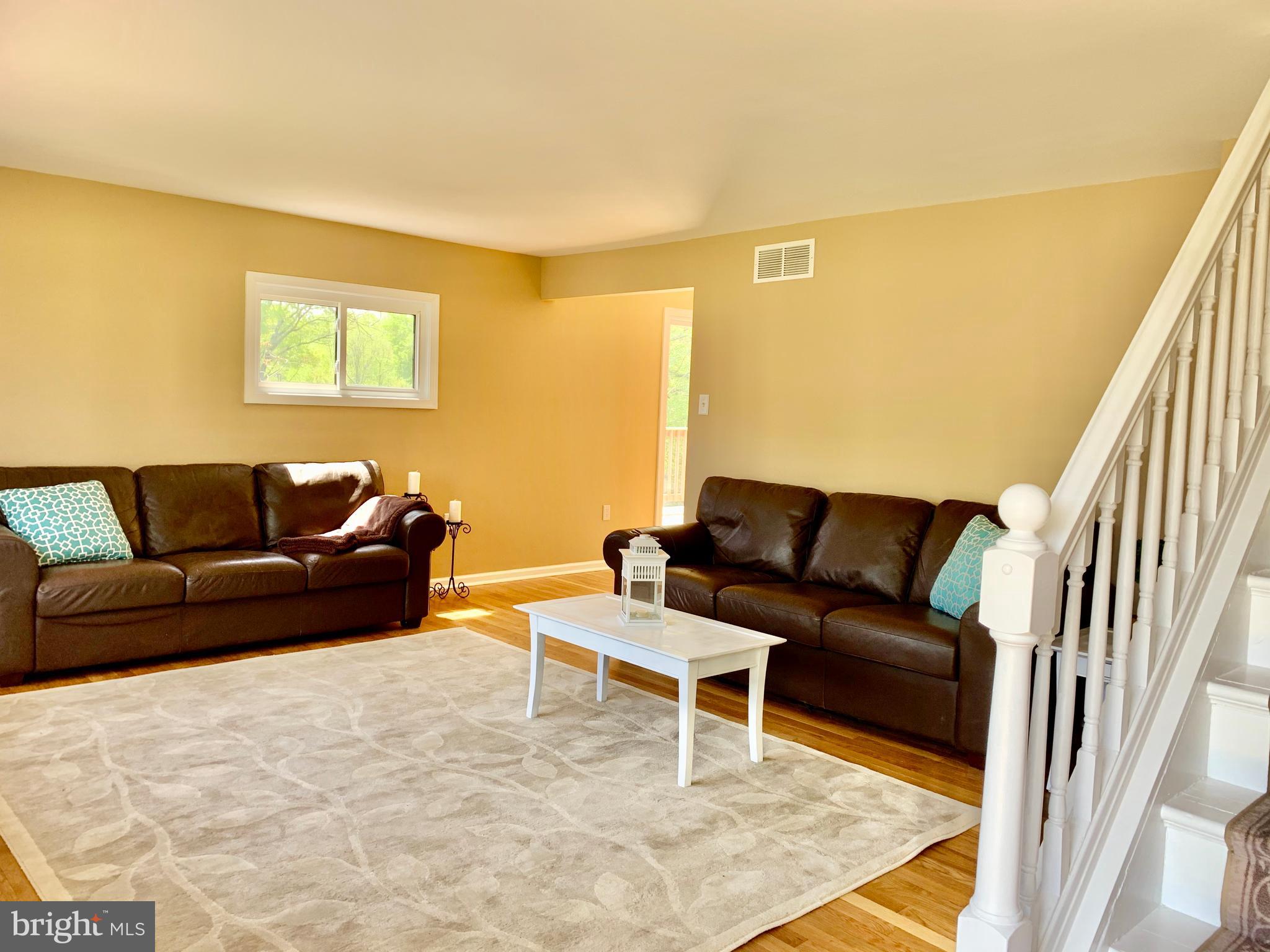 108 West Roland Avenue Maple Shade, NJ 08052 - Photo 5 of 23 a living room with furniture and a rug