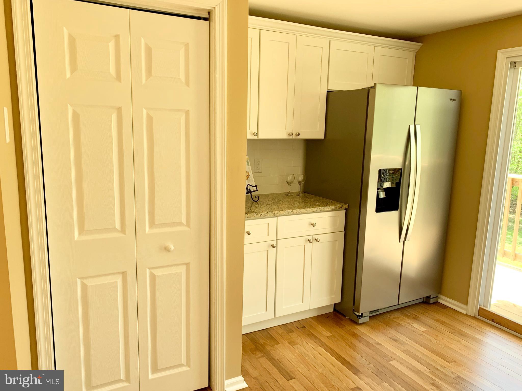 108 West Roland Avenue Maple Shade, NJ 08052 - Photo 9 of 23 a kitchen with stainless steel appliances a refrigerator and cabinets