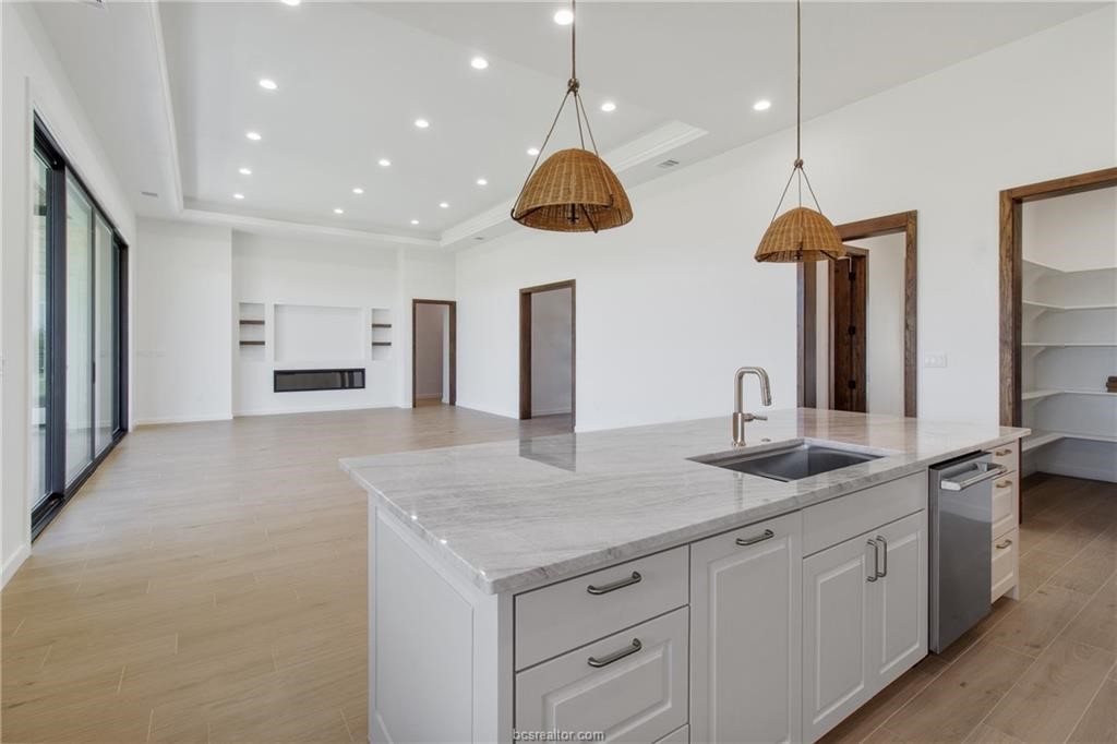 4558 Hicks Lane Bryan, TX 77845 - Photo 14 of 48 a kitchen with sink and window