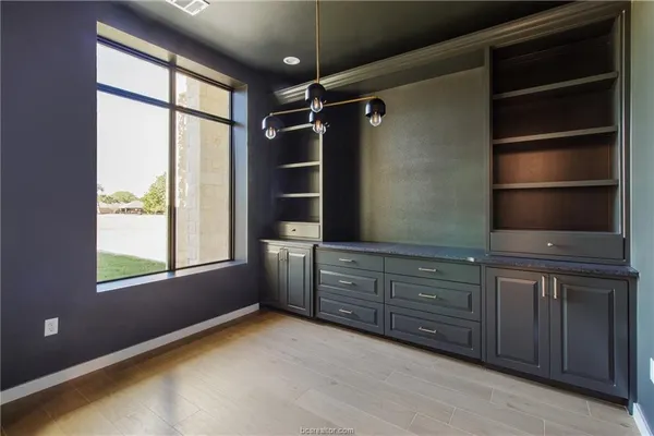 a room with furniture and window