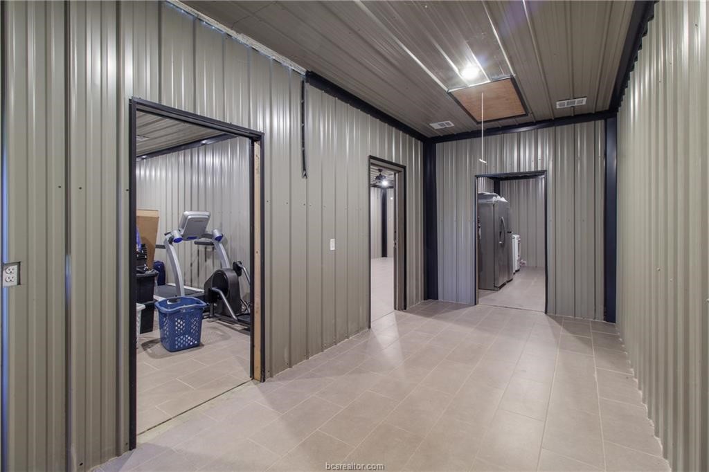 4558 Hicks Lane Bryan, TX 77845 - Photo 41 of 48 a view of a hallway with living room
