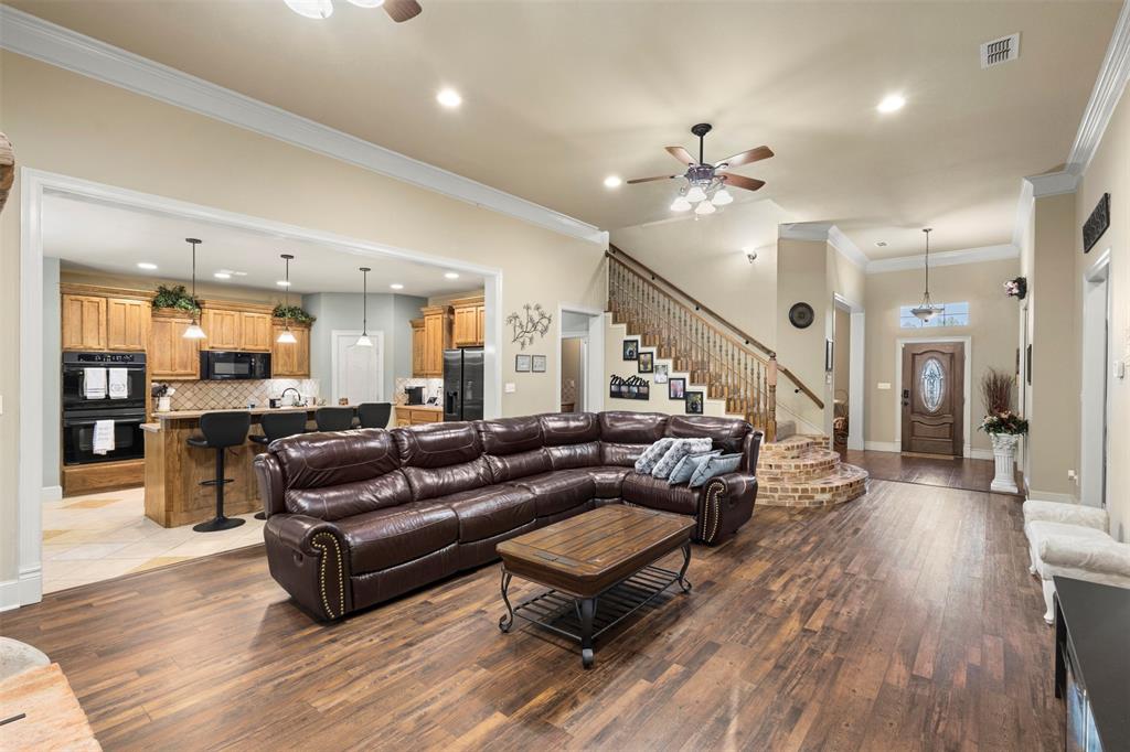 105 Country Ridge Court Red Oak, TX 75154 - Photo 12 of 40 a living room with furniture and wooden floor