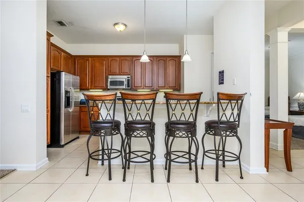 a view of a dining room with furniture