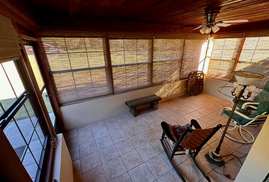 5912 Bailey Road Plant City, FL 33565 - Photo 17 of 30 a room with gym equipment and a large window