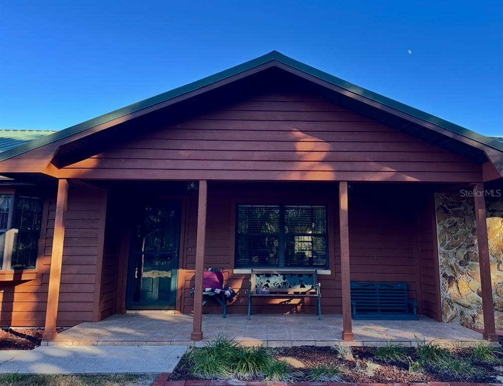 5912 Bailey Road Plant City, FL 33565 - Photo 4 of 30 a view of a house with patio