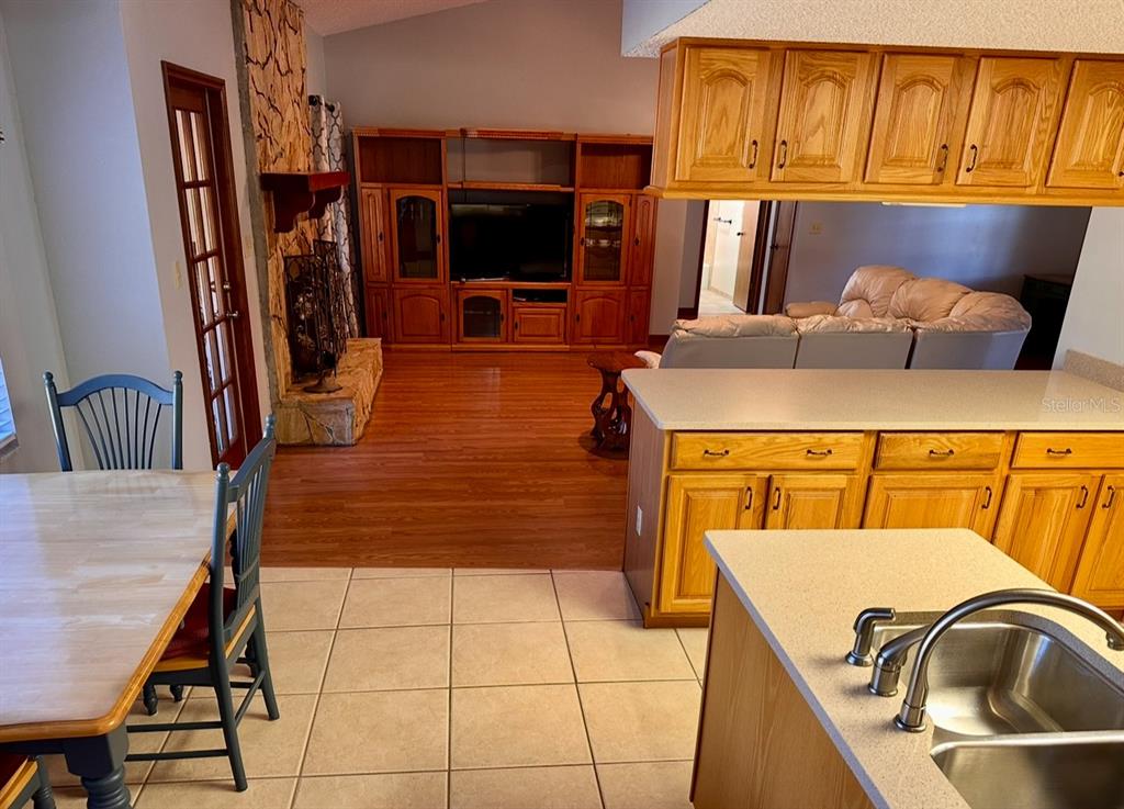 5912 Bailey Road Plant City, FL 33565 - Photo 8 of 30 a view of a kitchen with a sink and a refrigerator