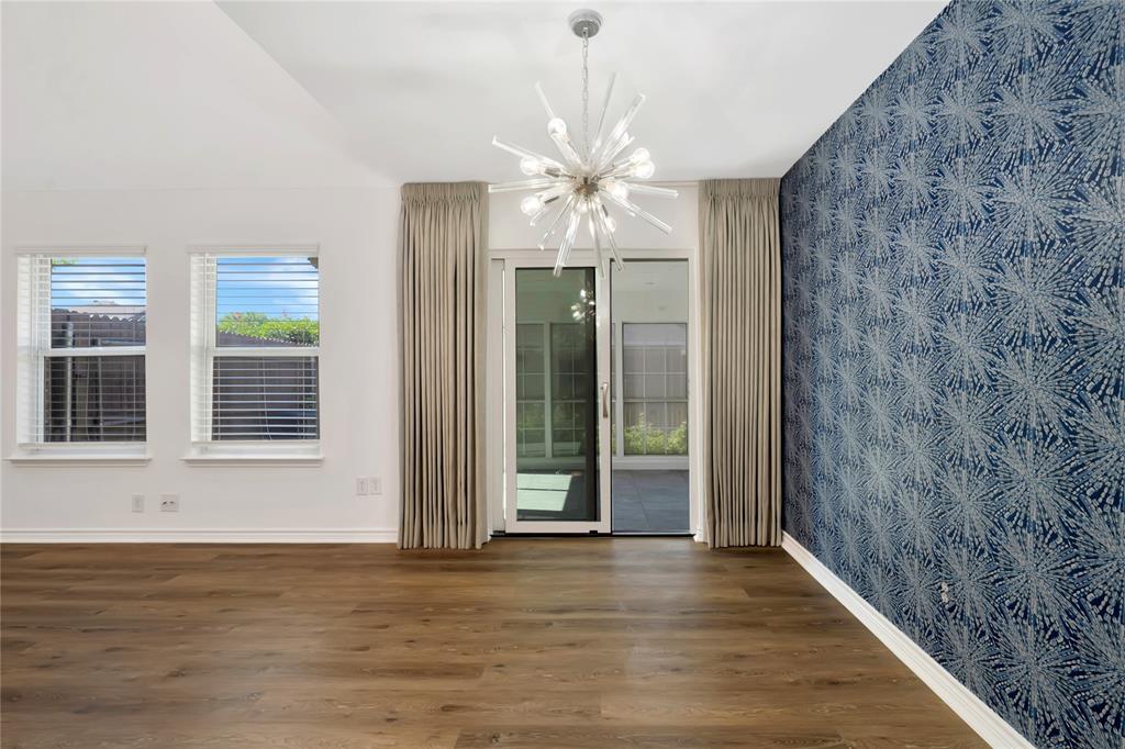 2909 Normandy Court Euless, TX 76039 - Photo 10 of 36 wooden floor in an empty room with a window