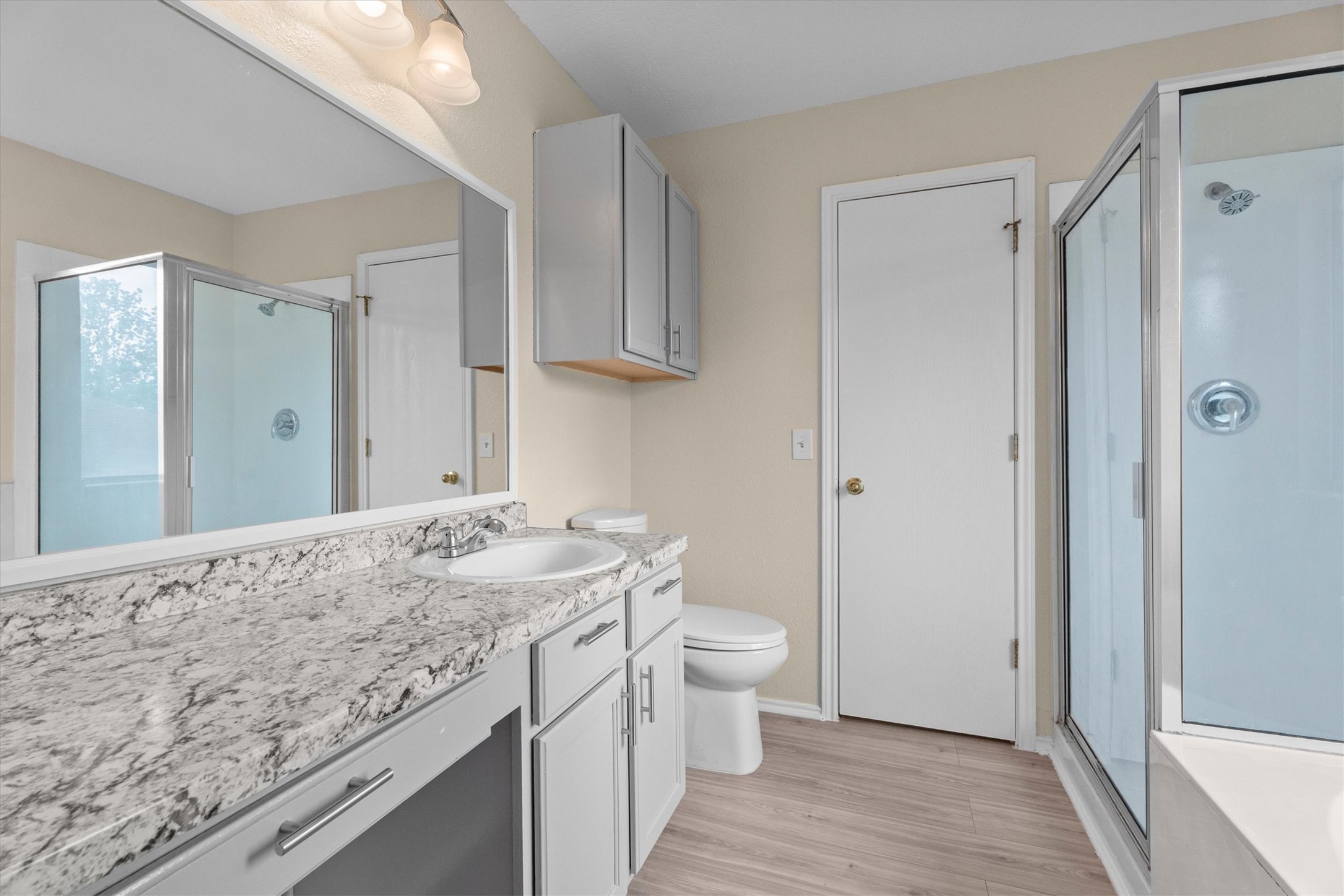 172 Discovery Kyle, TX 78640 - Photo 7 of 21 Primary bathroom featuring generous counter space, extra storage, and a bright open feel.